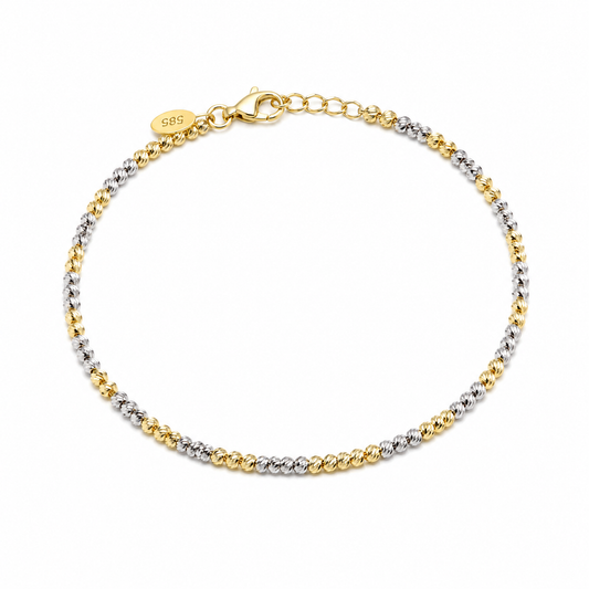 Narukvica zlatna 14KT višebojna

Ova elegantna narukvica izrađena je od 14-karatnog zlata u višebojnoj izvedbi koja joj daje moderan i poseban izgled. Njezina dužina od 19 cm osigurava ugodno nošenje i savršeno pristajanje. Zahvaljujući bezvremenskom dizajnu i kombinaciji tonova zlata, idealna je za svakodnevno nošenje ili posebne prigode, dodajući sofisticiran i luksuzan detalj vašem stilu.